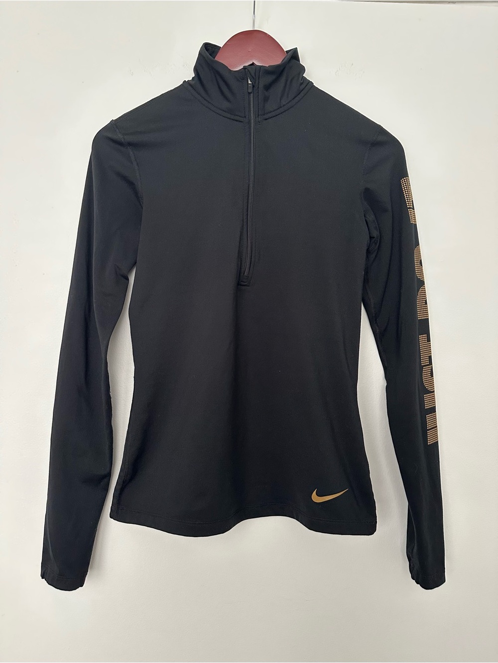 Nike Women’s Black Long-Sleeve Half-Zip Top with Gold Accents